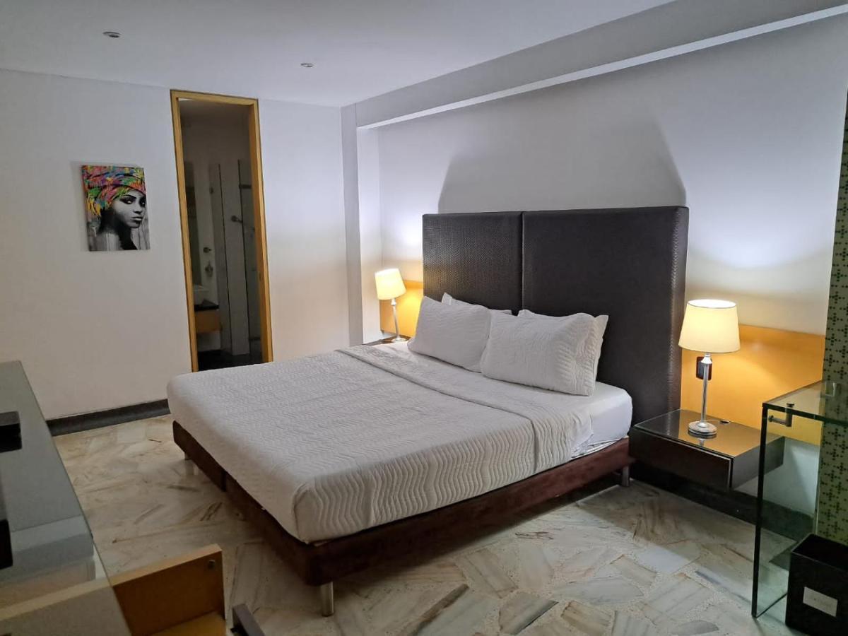 Aw Hotel Luxor Versalles Cali Bagian luar foto