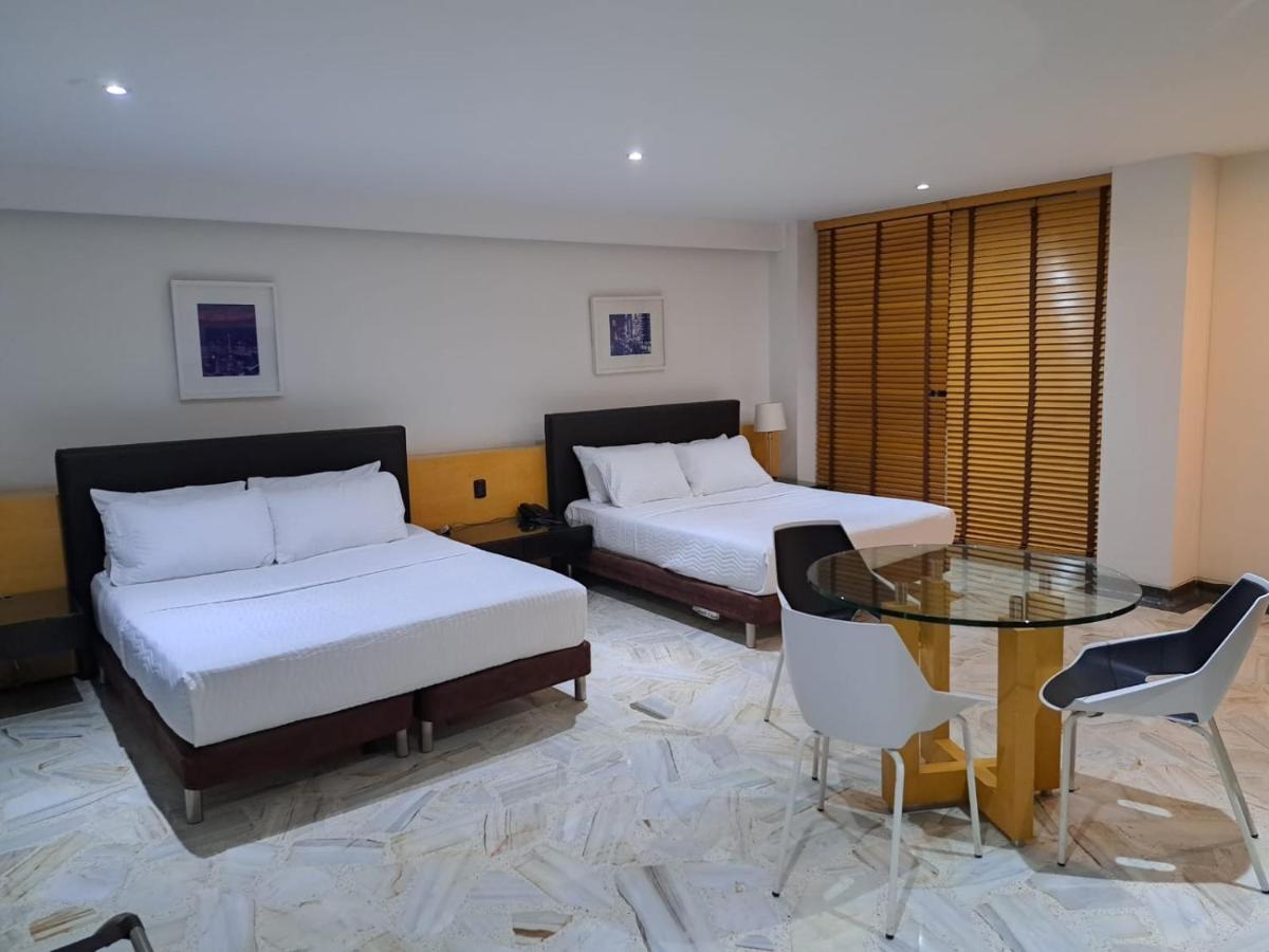 Aw Hotel Luxor Versalles Cali Bagian luar foto