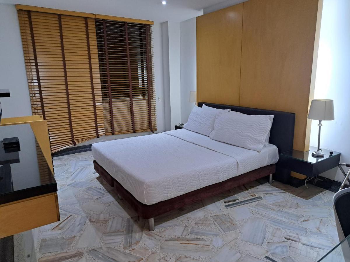 Aw Hotel Luxor Versalles Cali Bagian luar foto